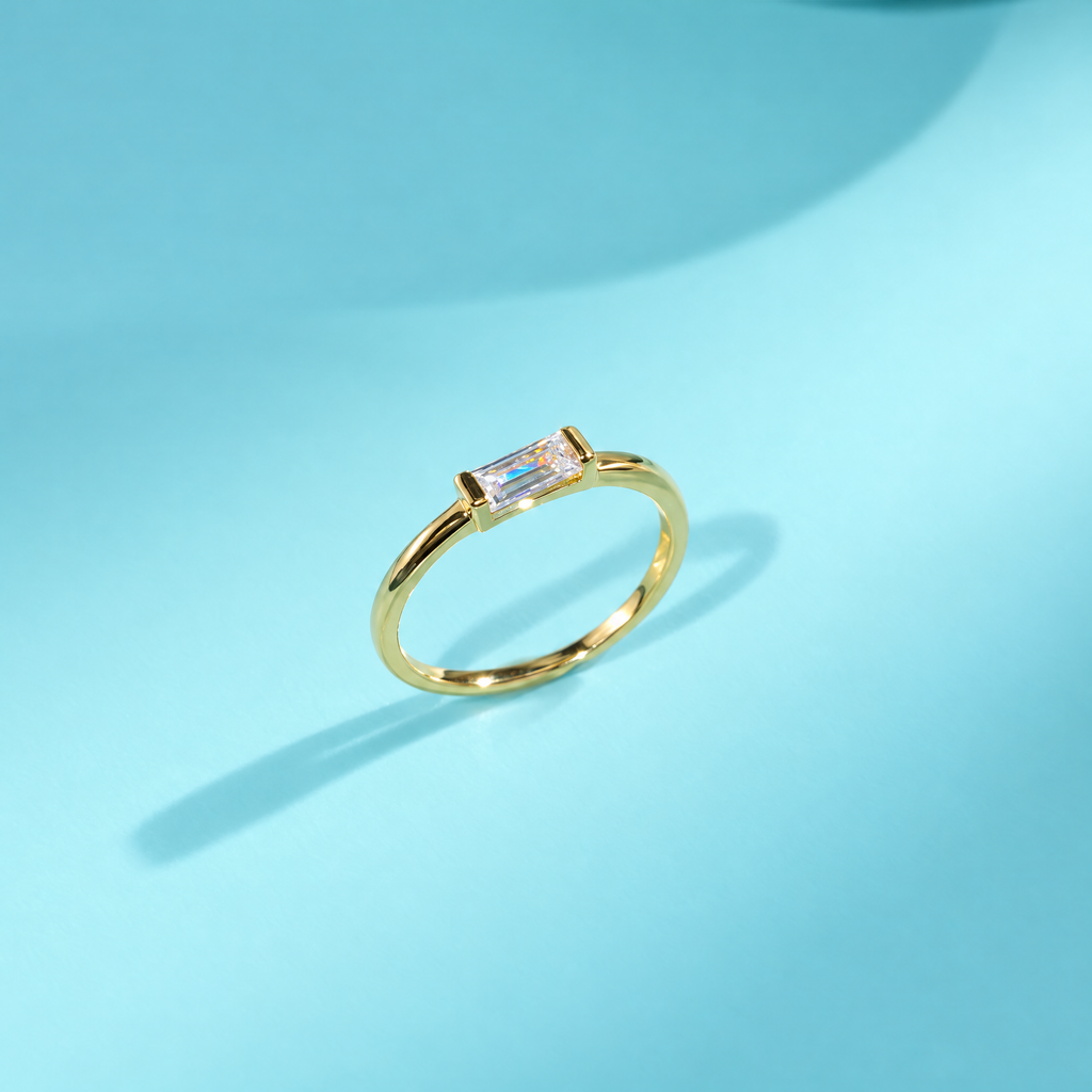 The Lyra Emerald-Cut Statement Ring — Genuine eight-second opposite-angle video view; AI-enhanced supplier view
