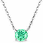 Close macro view of the green round rose-cut zirconia pendant, its four-prong Sterling Silver setting, and partial linked chain, on a seamless white studio background with a soft contact shadow. Studio edit and AI enhancement of the existing view; not independently photographed jewelry.
