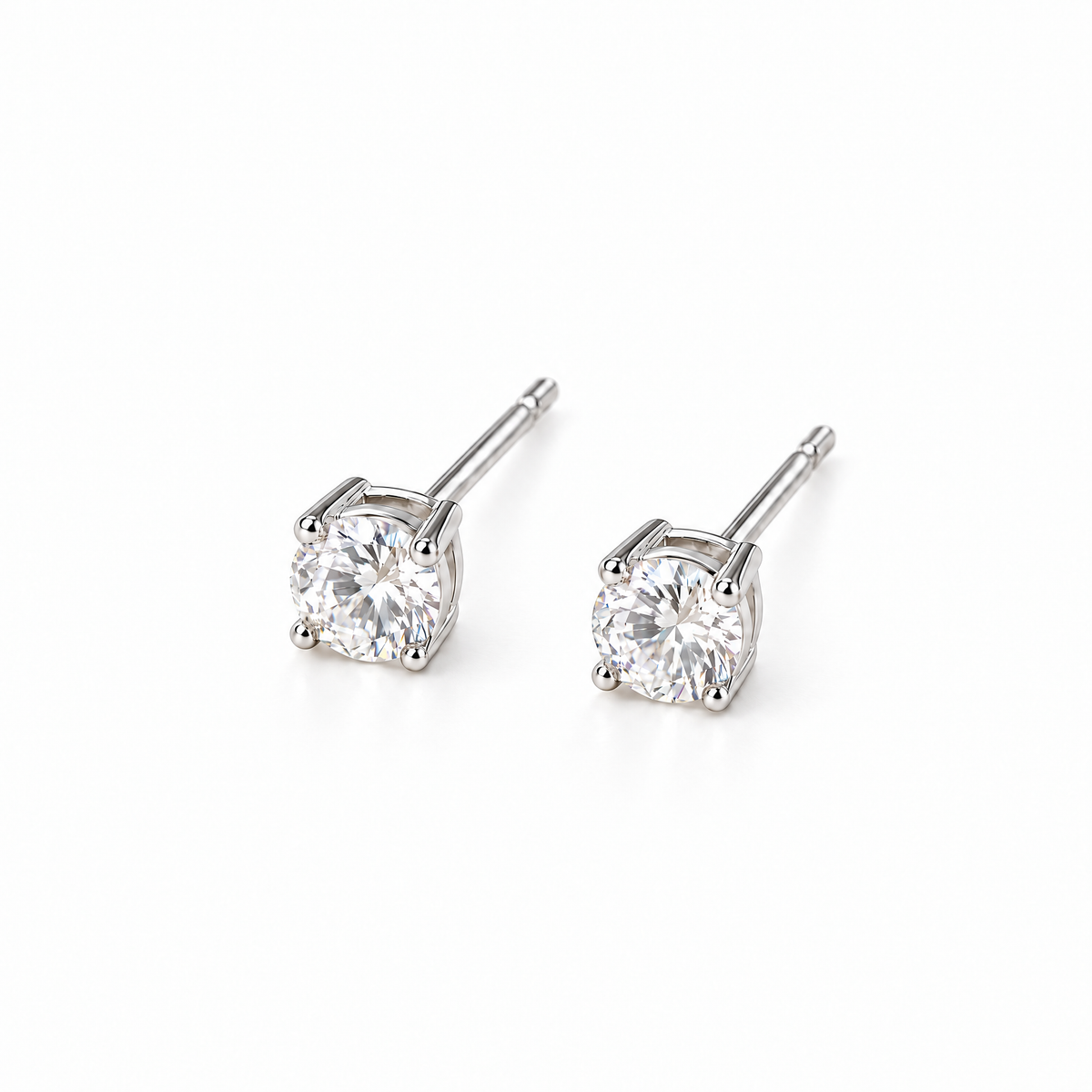 The Neva CZ Stud Earrings — silver-tone elevated macro pair view in a white studio with soft contact shadows; studio edit and AI enhancement of the existing reference-based AI visualization.