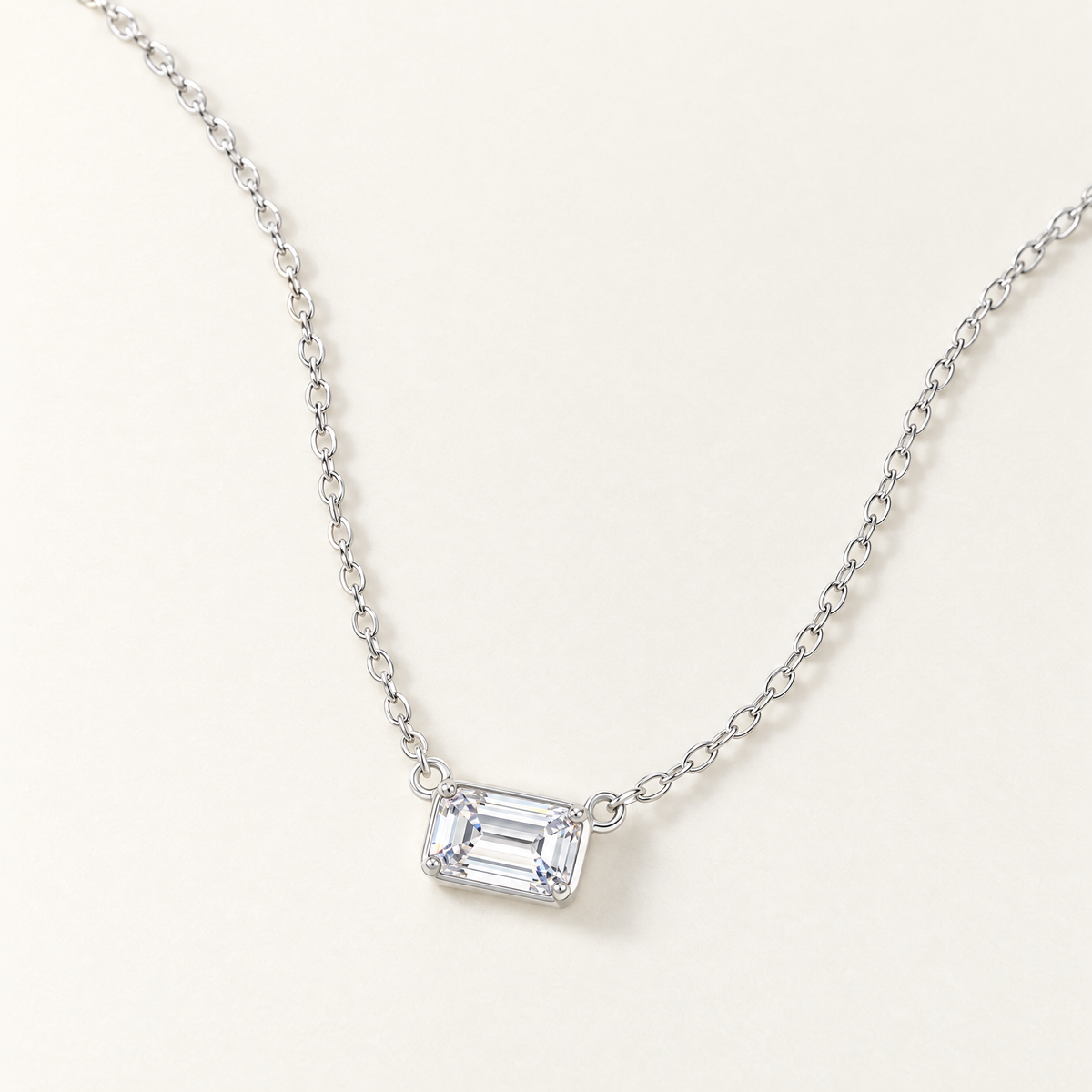 The Mara Geometric CZ Pendant — Shallow-oblique tabletop full necklace; reference-based AI visualization