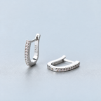 The Aria CZ Hoops — clean studio pair, upright and lying silver U-shaped hoops; supplier-reference AI enhancement with promotional background wordmark removed