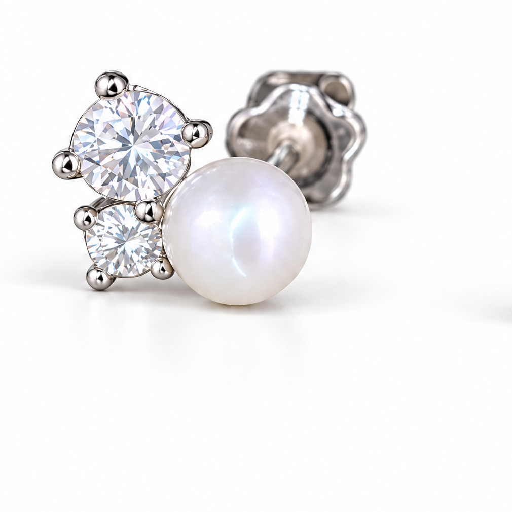 Macro detail crop of one sterling silver pearl and moissanite stud earring on a white studio background.