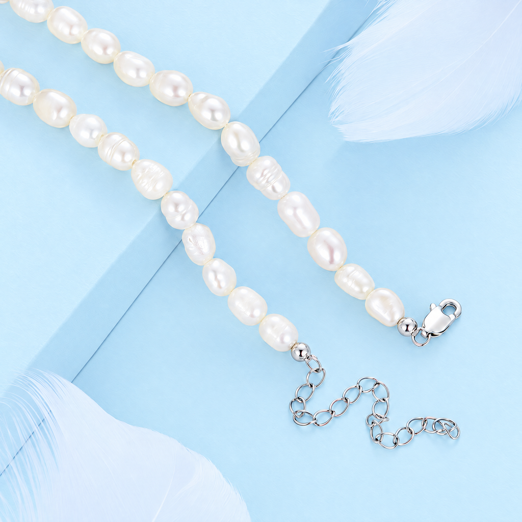 The Vesper Freshwater Pearl Strand — Lobster clasp and extension-chain close view; AI-enhanced supplier view