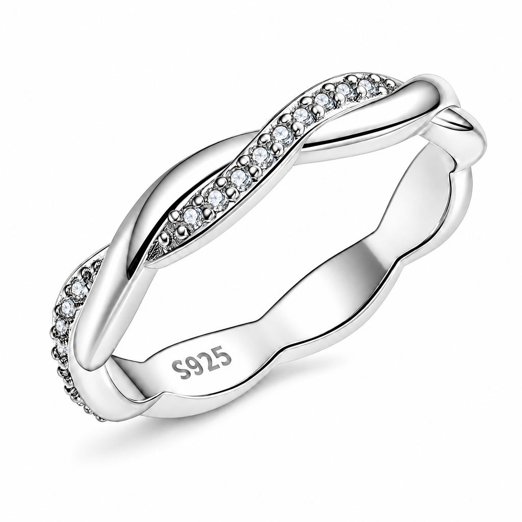 The Veda CZ Twisted Band — primary angled white-studio view with soft shadow; studio-white edit and AI enhancement of the inherited AI-enhanced supplier view, not independently photographed jewelry.