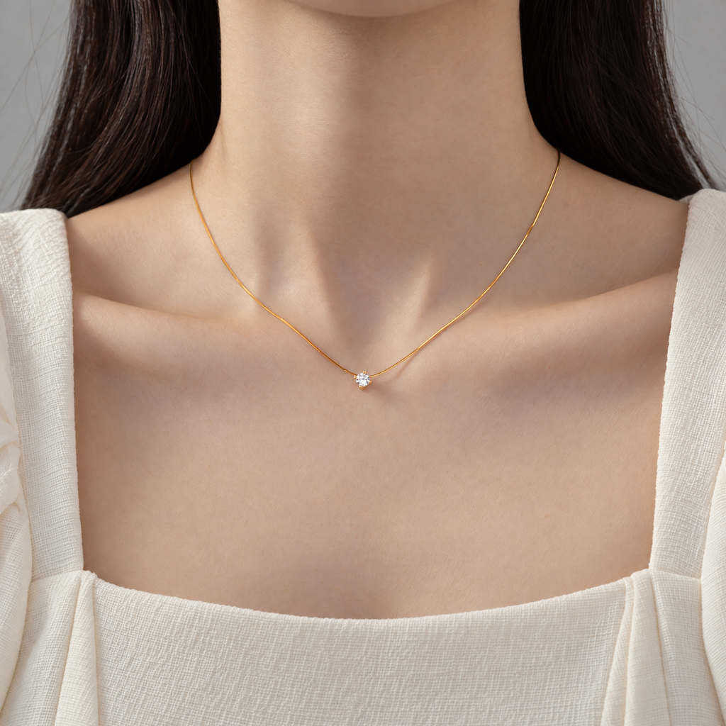 The Elora CZ Pendant — clean on-body detail coverage; reference-based AI visualization
