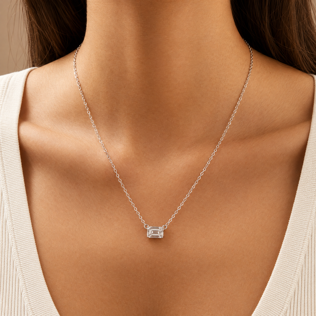 The Mara Geometric CZ Pendant — Single-necklace on-body front; reference-based AI visualization