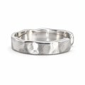 The Lena Hammered Open Band Ring in 925 sterling silver, front exterior view with white-studio lighting.