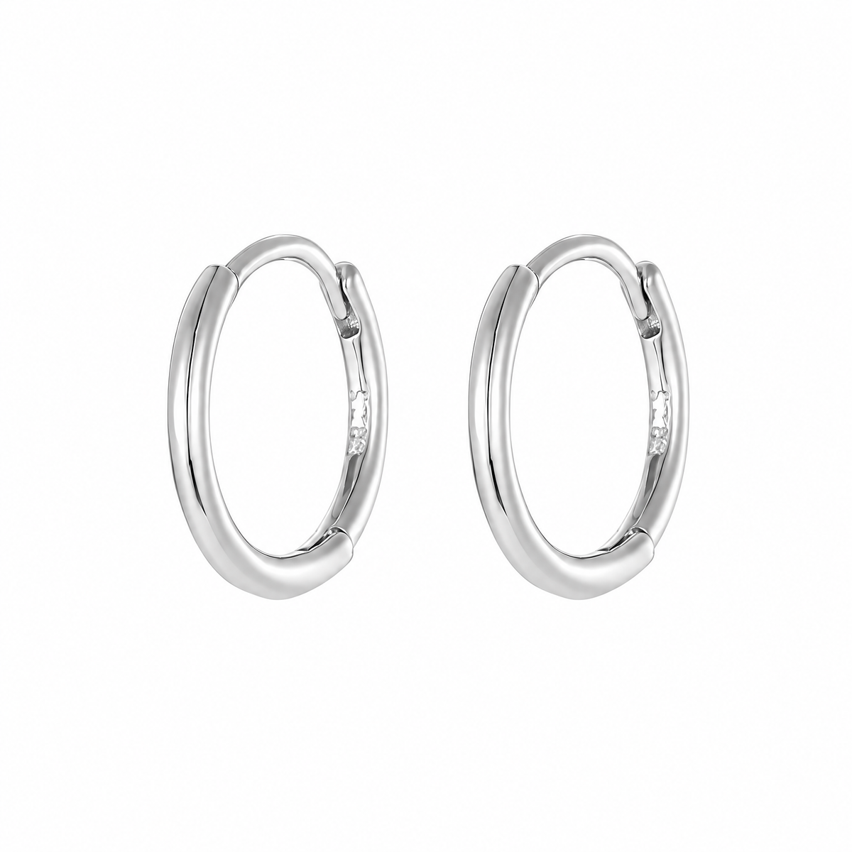 The Kiri Huggie Hoops — Verified supplier silver pair — straight product view; AI-enhanced supplier view