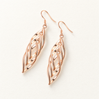 The Sova Drop Earrings — Gold-only diagonal studio flat lay; reference-based AI visualization
