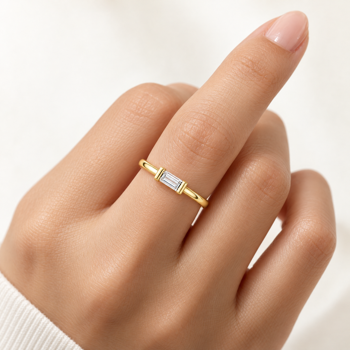 The Lyra Emerald-Cut Statement Ring — Source-reference-based on-hand view; reference-based AI visualization