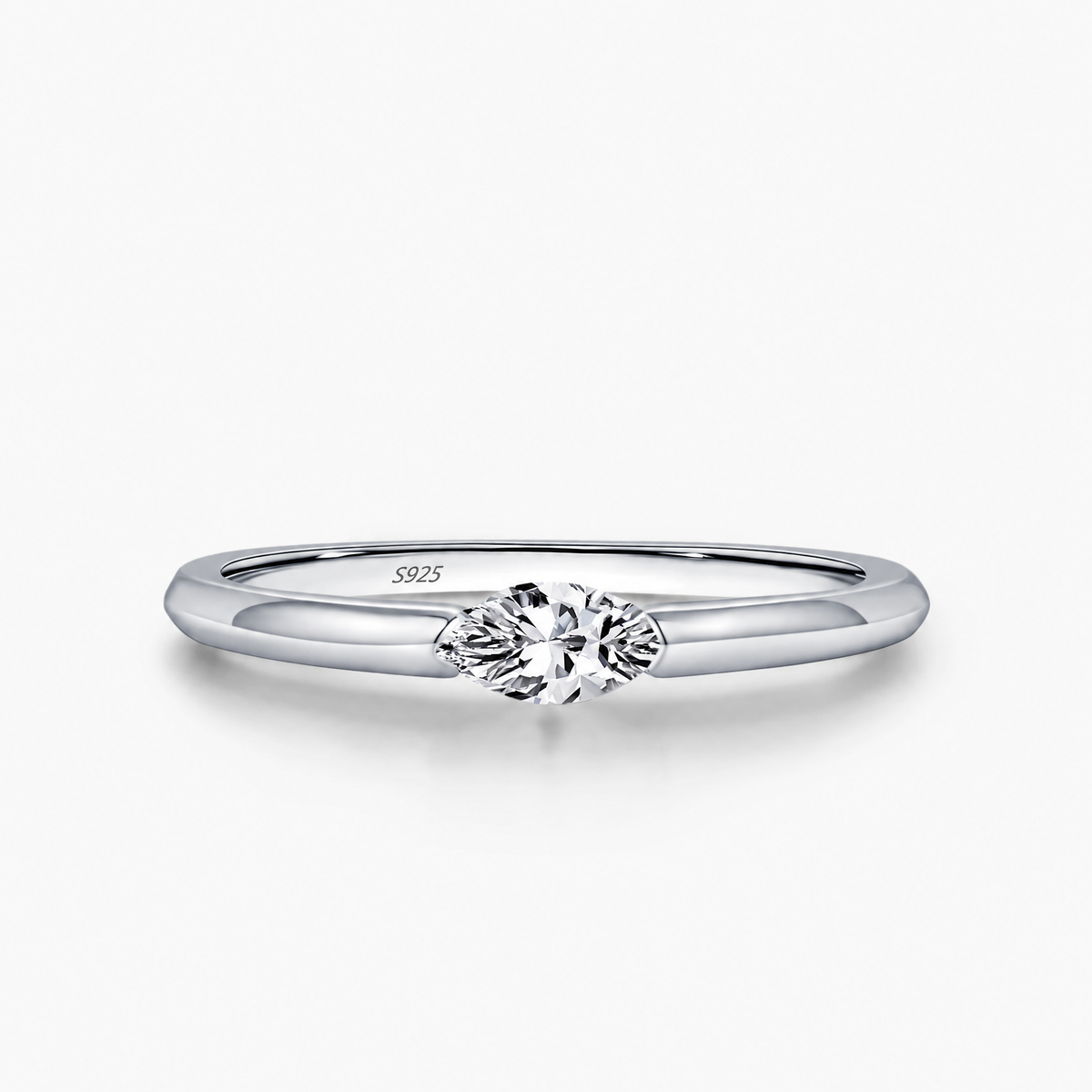 The Aure Marquise-Cut CZ Ring in silver, interior band detail on a white studio background.