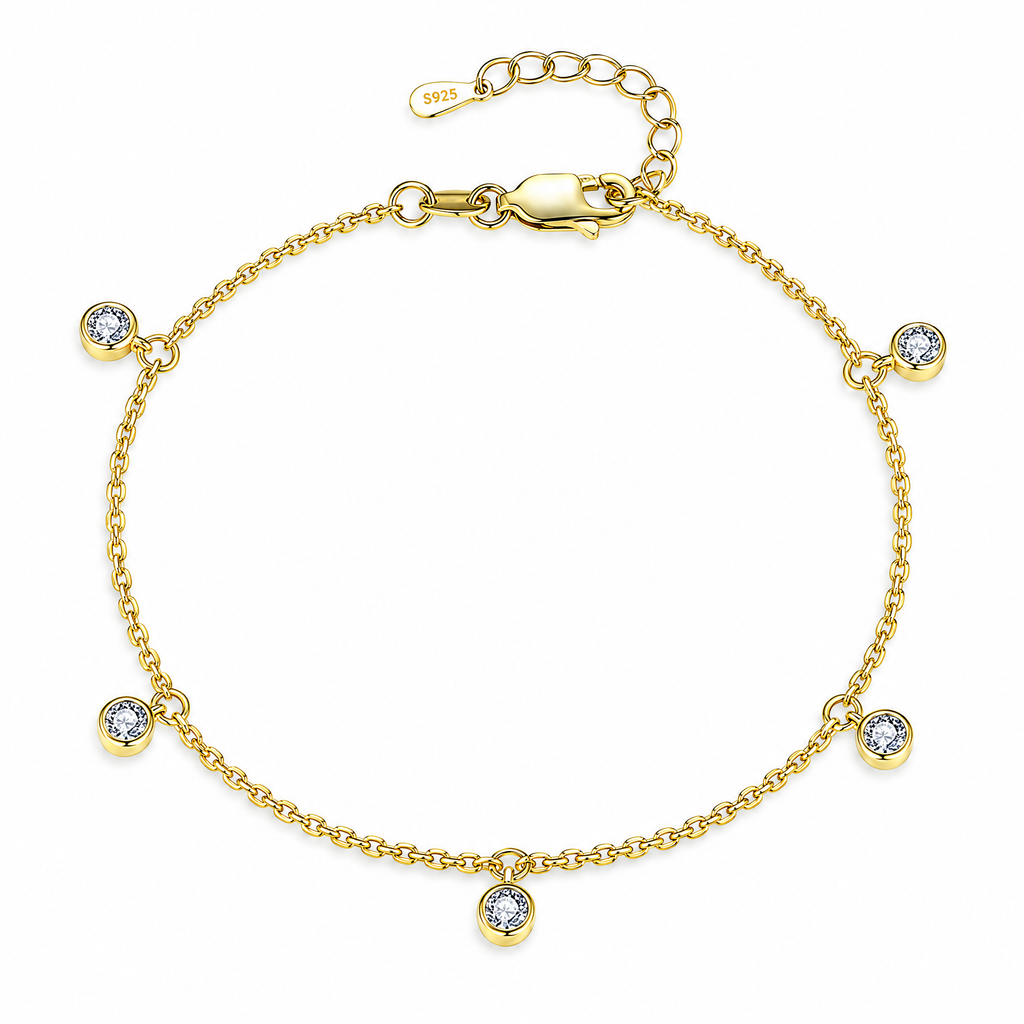 Gold Tone Helle Moissanite Station Bracelet in a full white studio view, showing five round bezel stations, clasp, extension chain and S925 end tag.