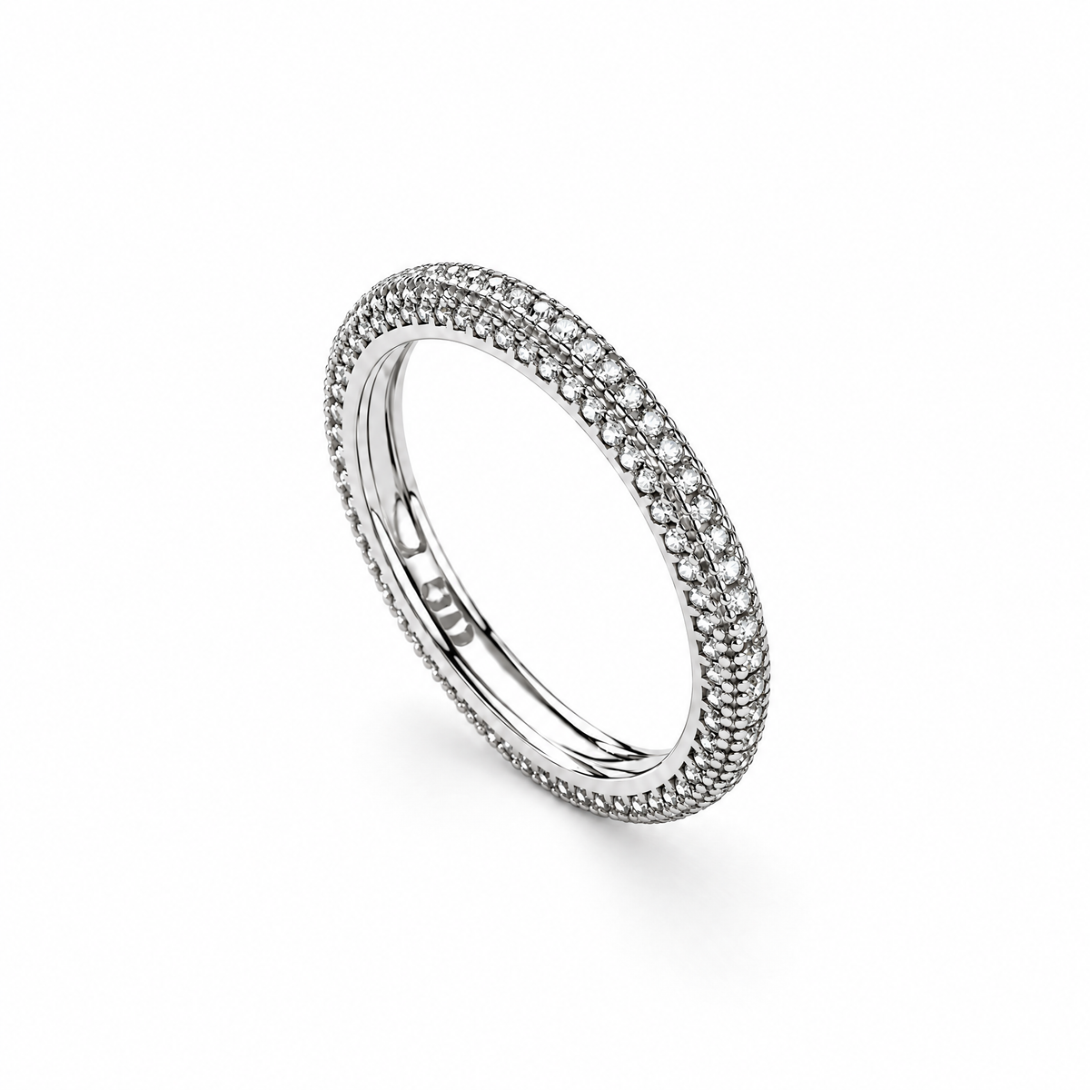 The Klint CZ Pavé Band — three-quarter upright view in a seamless white studio with soft shadow; studio edit and AI enhancement of the existing AI-enhanced supplier view.