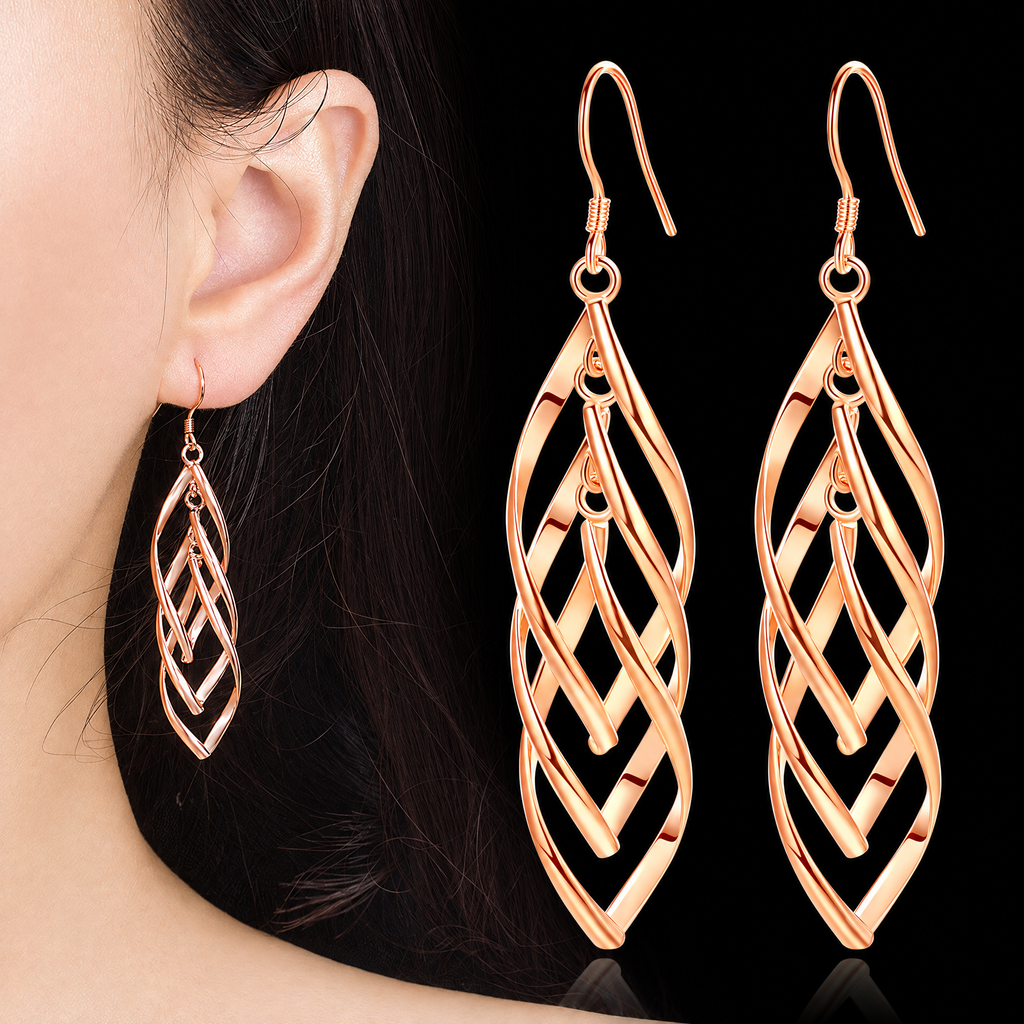The Sova Drop Earrings — On-ear scale view with matching pair; AI-enhanced supplier view