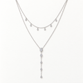 The Lyra Y-Drop Lariat — Silver full flat-lay close view; reference-based AI visualization