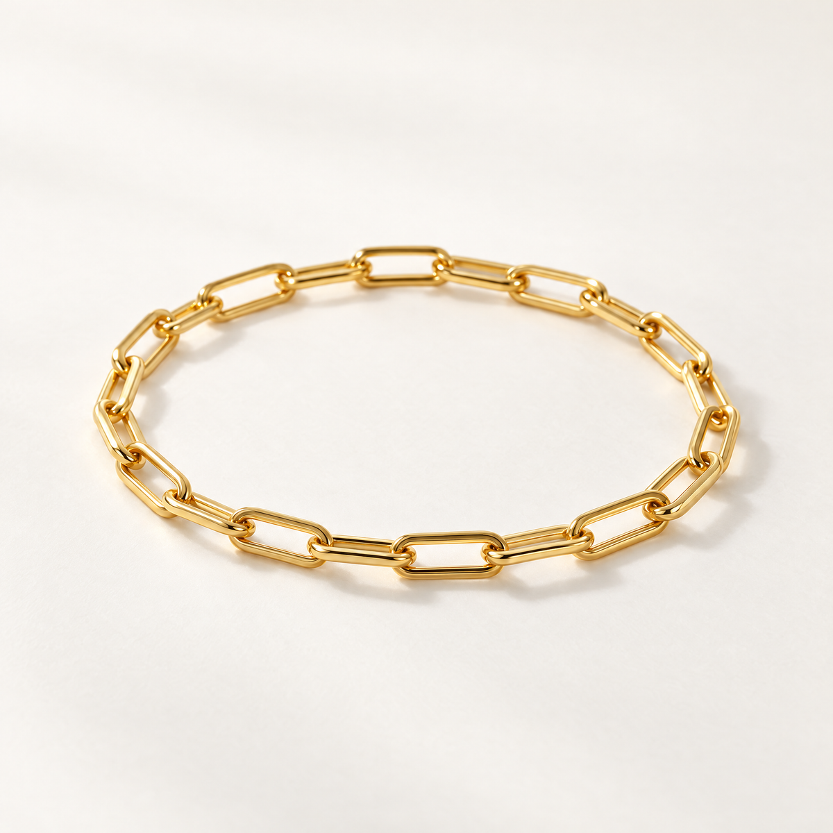 The Linnea Link Bracelet — Gold bracelet low-angle oval — reference-based visualization; reference-based AI visualization