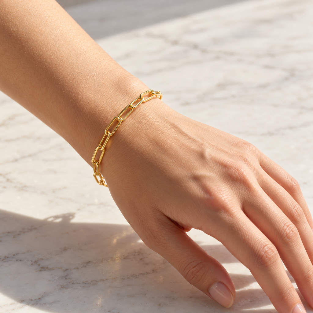 The Linnea Link Bracelet — Gold bracelet full on-wrist view — reference-based visualization; reference-based AI visualization