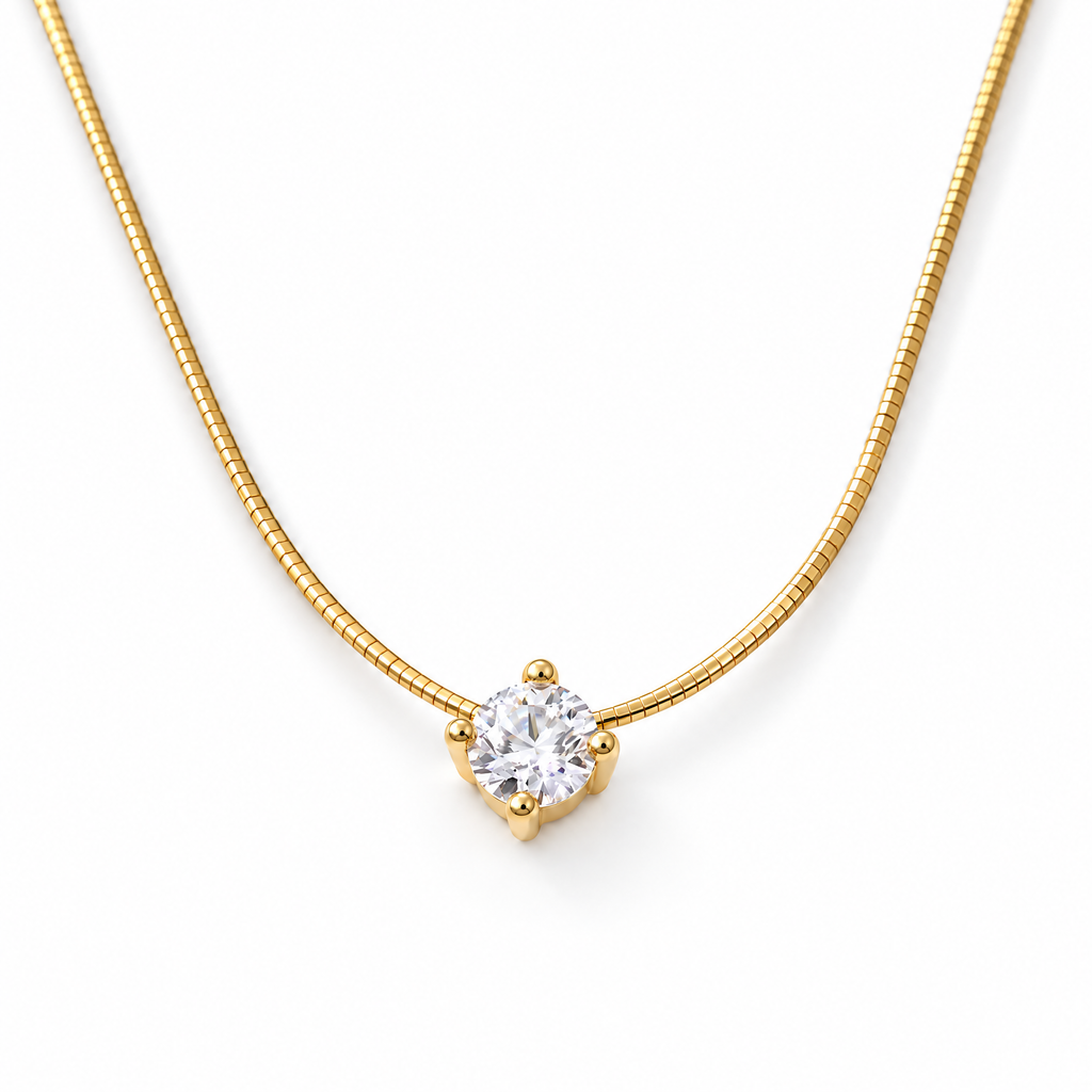 The Halcyon Round CZ Pendant — gold pendant macro, four-prong front view in a white studio treatment; reference-based AI visualization.