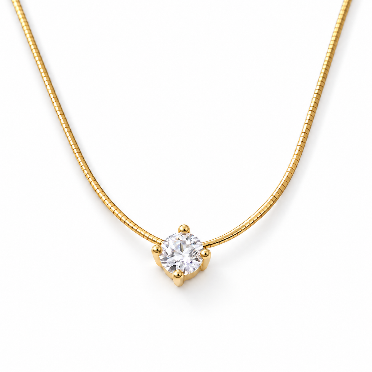 The Halcyon Round CZ Pendant — gold pendant macro, four-prong front view in a white studio treatment; reference-based AI visualization.
