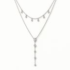 The Lyra Y-Drop Lariat — Silver upper-drape detail — correct main setting; reference-based AI visualization