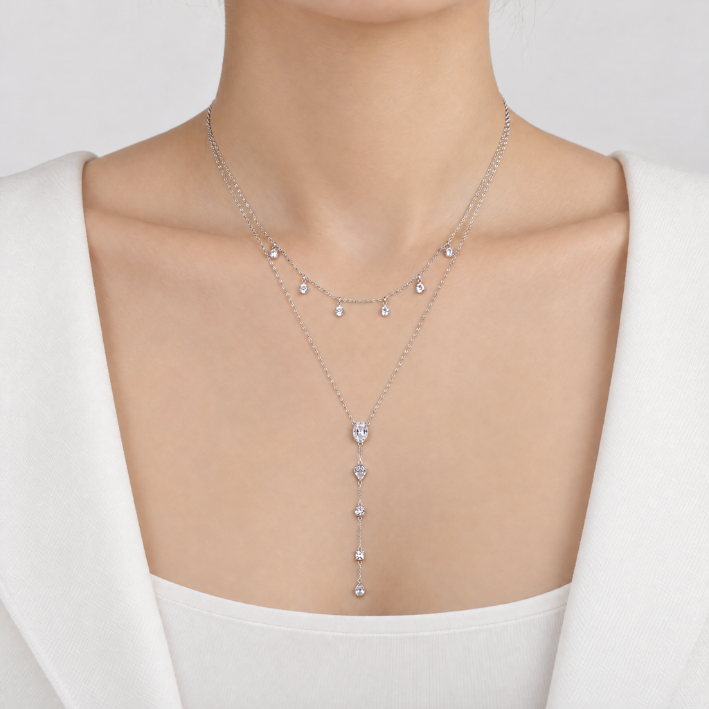 The Lyra Y-Drop Lariat — Silver on-body front view — correct main setting; reference-based AI visualization