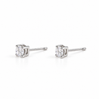The Neva CZ Stud Earrings — silver-tone side-profile pair view in a white studio with soft contact shadows; studio edit and AI enhancement of the existing reference-based AI visualization.