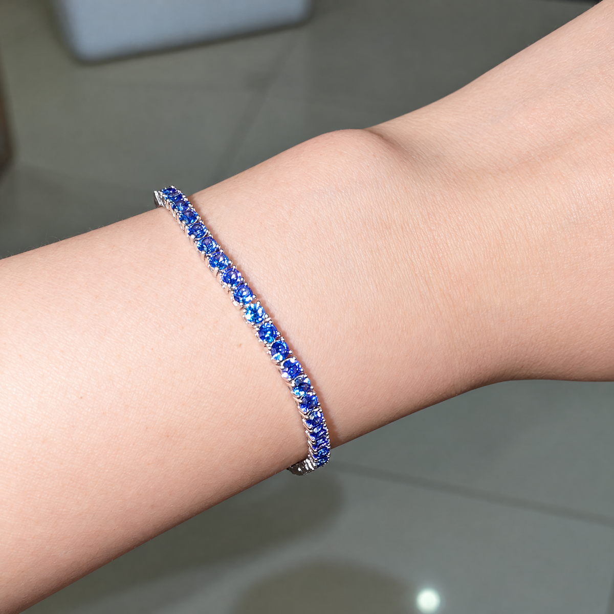 The Orla Tennis Bracelet — Rotated top-wrist view from supplier rotation video; AI-enhanced supplier view