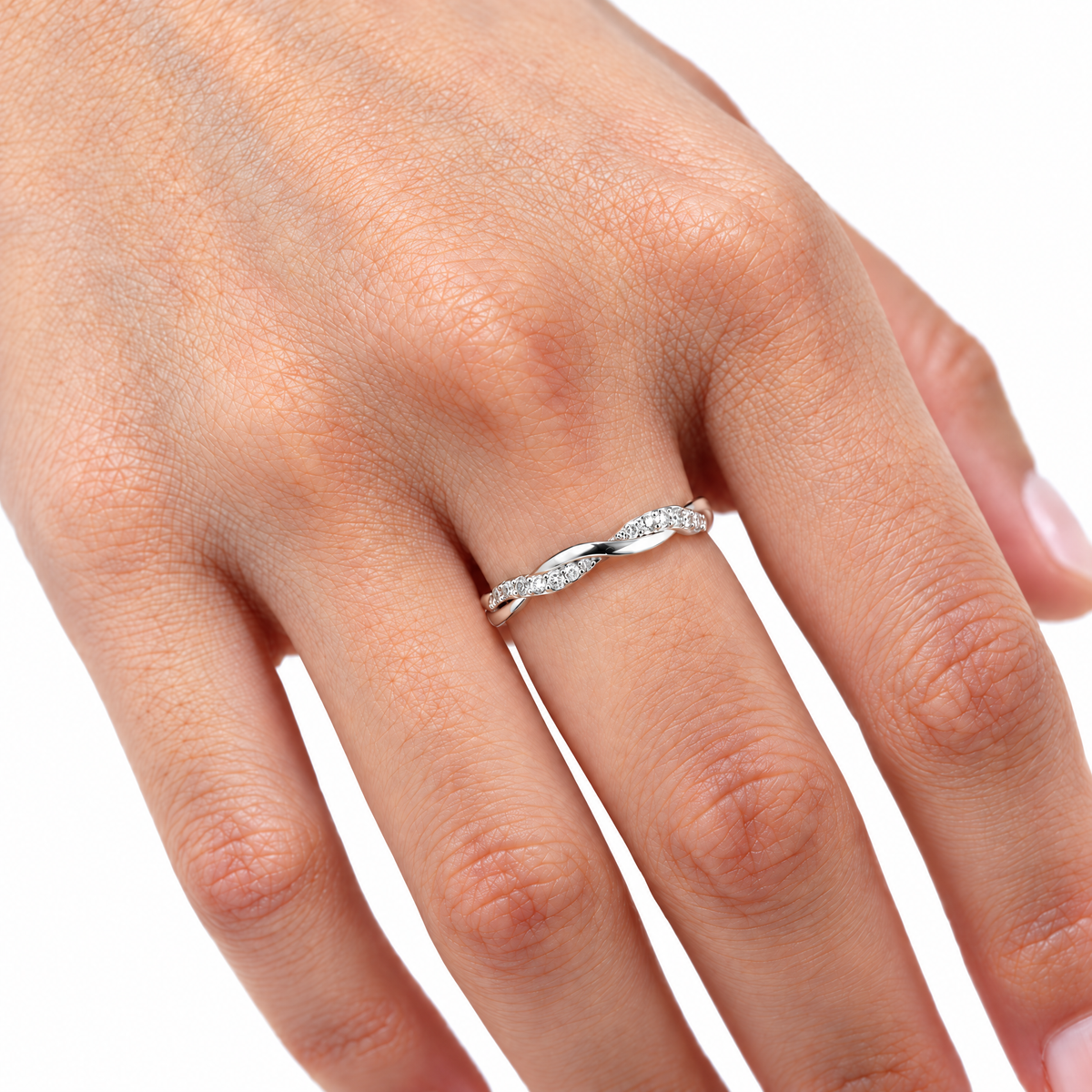 The Veda CZ Twisted Band — on-hand selected-silver white-studio view; studio-white edit and AI enhancement of the inherited reference-based AI visualization, not independently photographed jewelry.