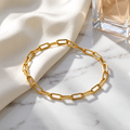 The Linnea Link Bracelet — Gold bracelet studio flat lay — restored supplier photograph; AI-enhanced supplier view