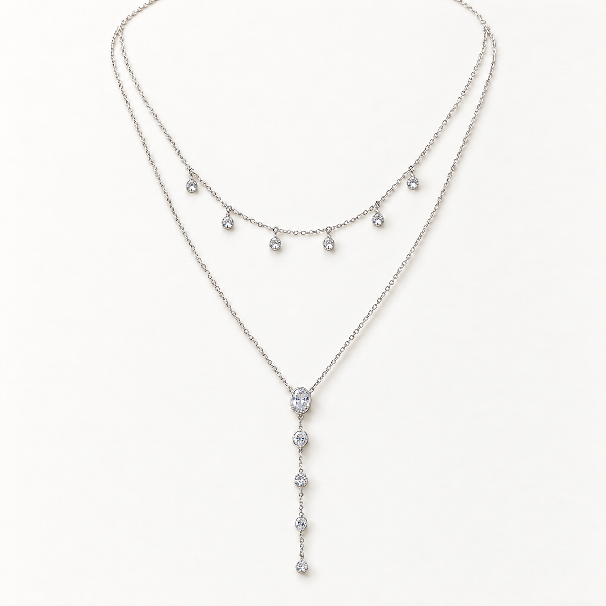 The Lyra Y-Drop Lariat — Silver full relaxed-drape view; reference-based AI visualization