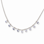 The Astrid CZ Link Necklace — silver-tone CZ charm necklace, tabletop front view in white studio; reference-based AI visualization.