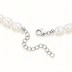 The Vesper Freshwater Pearl Strand — Reference-based clean clasp-and-pearl detail; reference-based AI visualization