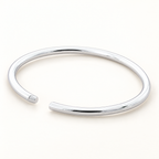 The Talo Open Cuff Bangle — Clean cream studio open-cuff view; reference-based AI visualization