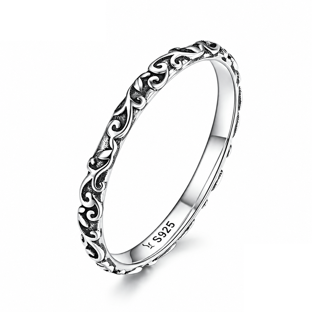 Product macro of the Sterling Silver engraved scroll band with its S925 inner-band mark visible.