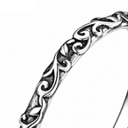 Sterling Silver engraved vine band — macro detail crop.