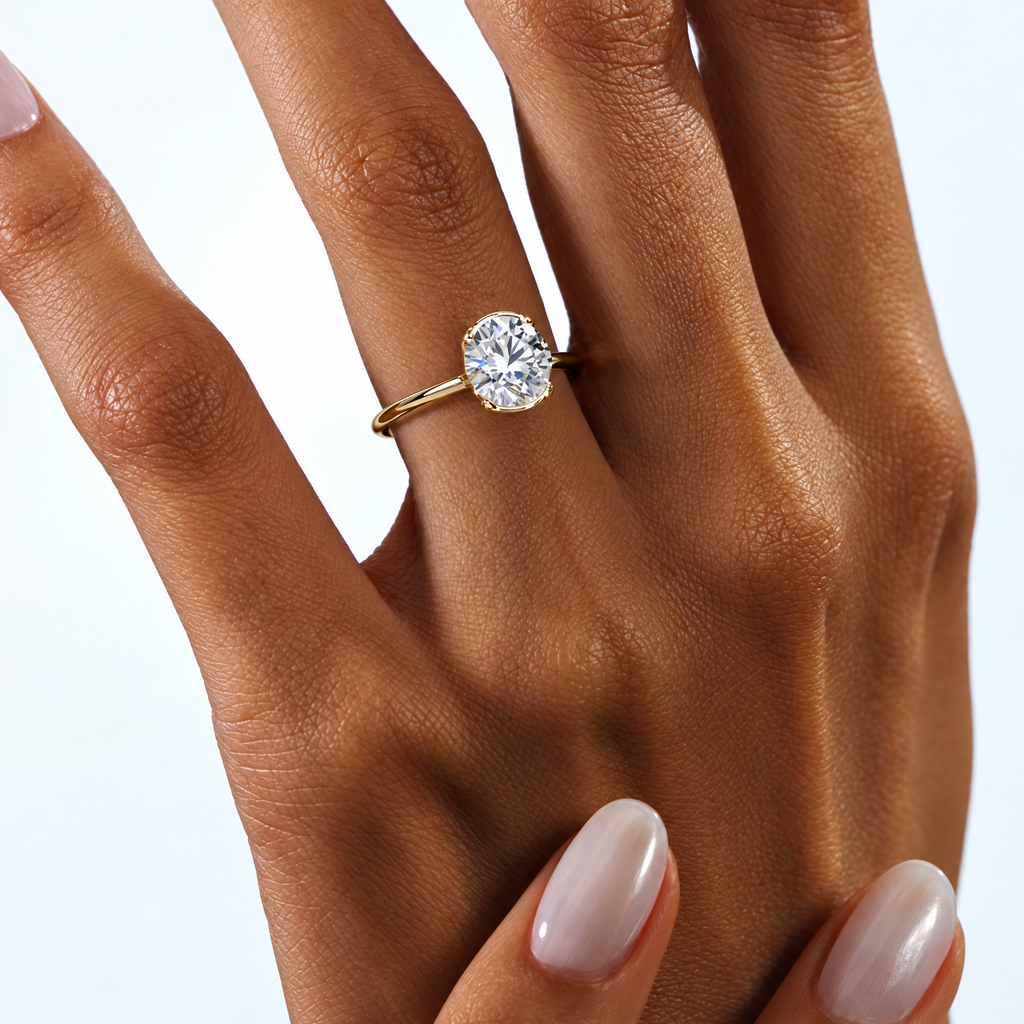 Astrea gold-tone moissanite solitaire ring — front-on worn view; AI-enhanced supplier view