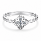 Clean white studio macro derivative of the four-lobed quatrefoil moissanite ring, preserving the front source angle and visible inner-band S925 hallmark.