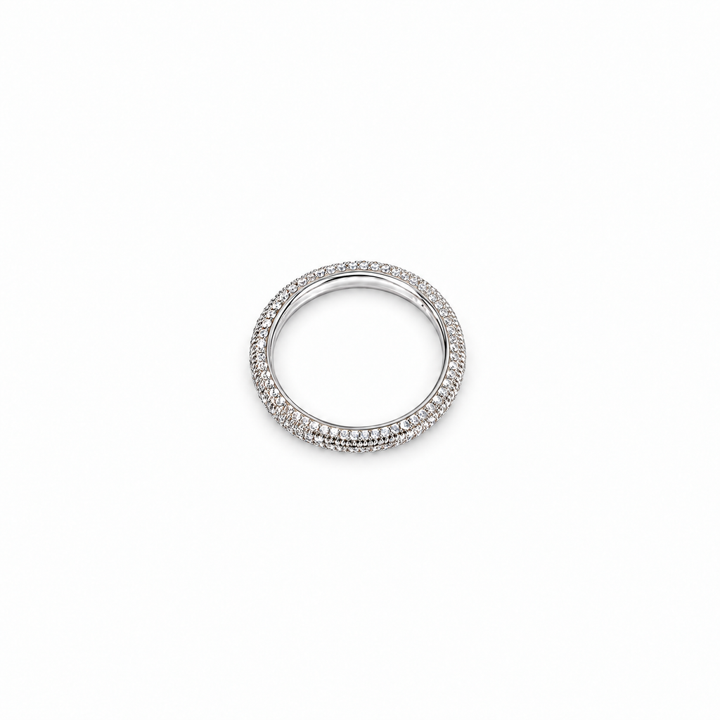 The Klint CZ Pavé Band — top-down rotation view in a seamless white studio with soft shadow; studio edit and AI enhancement of the existing AI-enhanced supplier view.