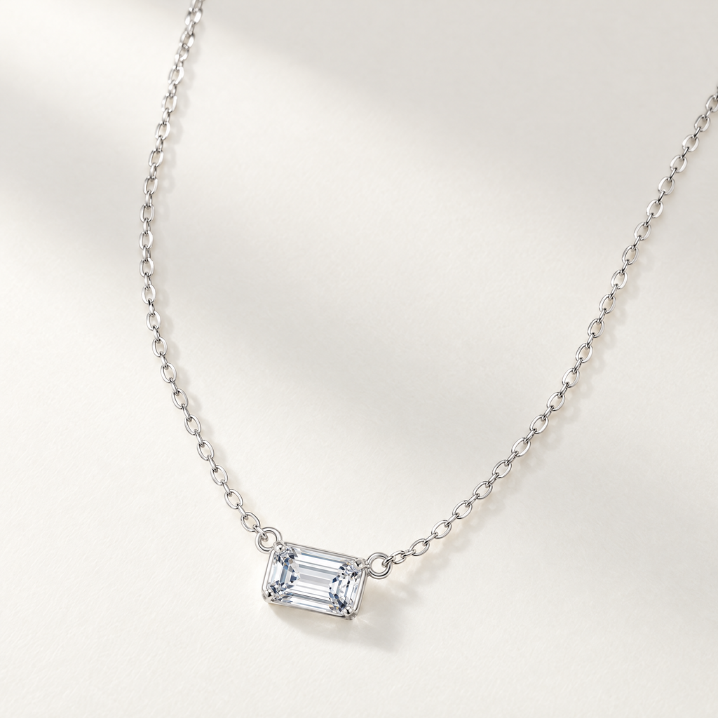 The Mara Geometric CZ Pendant — Asymmetric oblique tabletop necklace; reference-based AI visualization