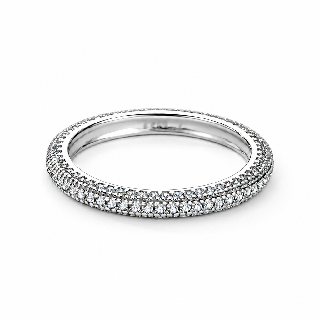 The Klint CZ Pavé Band — low-angle view in a seamless white studio with soft shadow; studio edit and AI enhancement of the existing AI-enhanced supplier view.