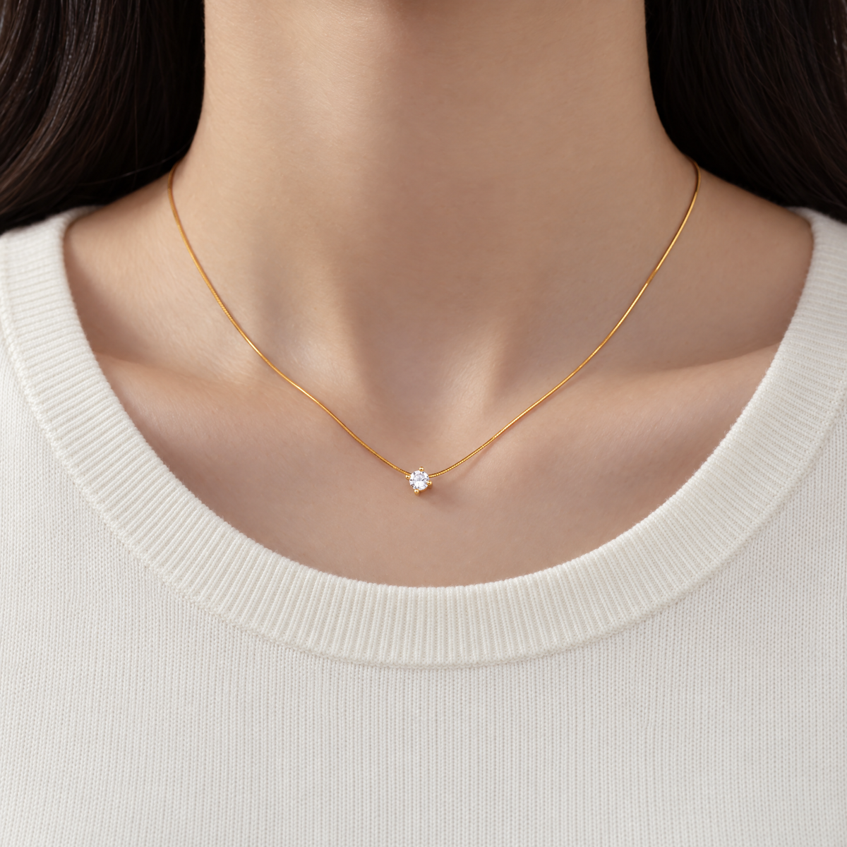 The Halcyon Round CZ Pendant — modest on-body gold pendant coverage; reference-based AI visualization