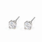 The Neva CZ Stud Earrings — silver-tone three-quarter pair view in a white studio with soft contact shadows; studio edit and AI enhancement of the existing reference-based AI visualization.