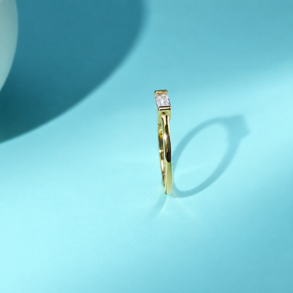 The Lyra Emerald-Cut Statement Ring — Genuine eleven-second side-front video view; AI-enhanced supplier view