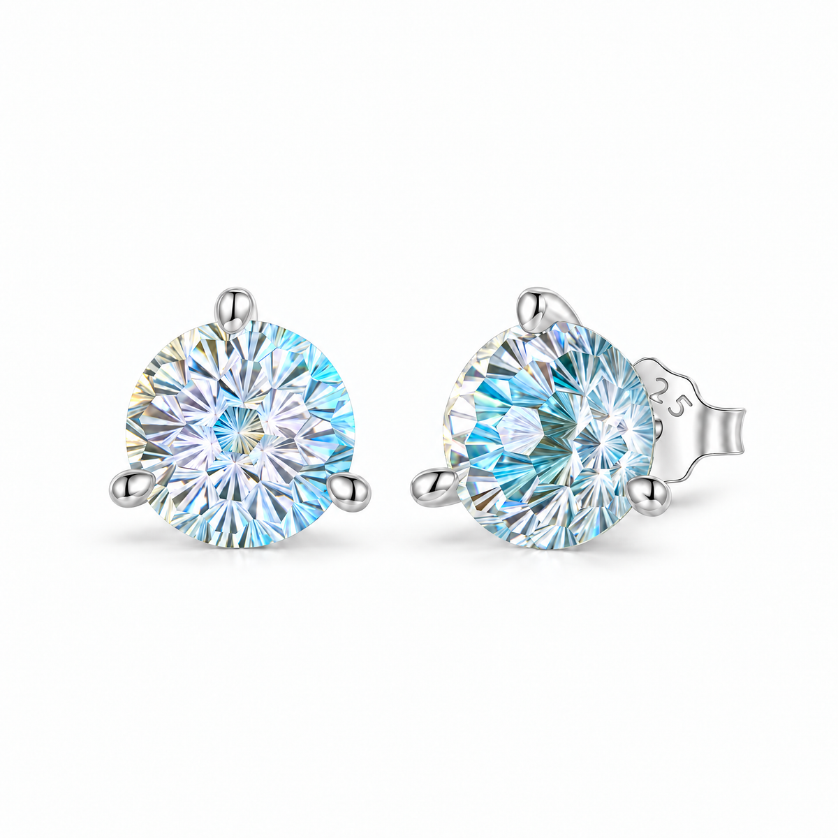 Pair of Rainbow CZ sterling silver stud earrings on a clean white studio background, showing one front-facing 7 mm round faceted blue-rainbow stone in a three-prong setting and one matching side view with butterfly back.