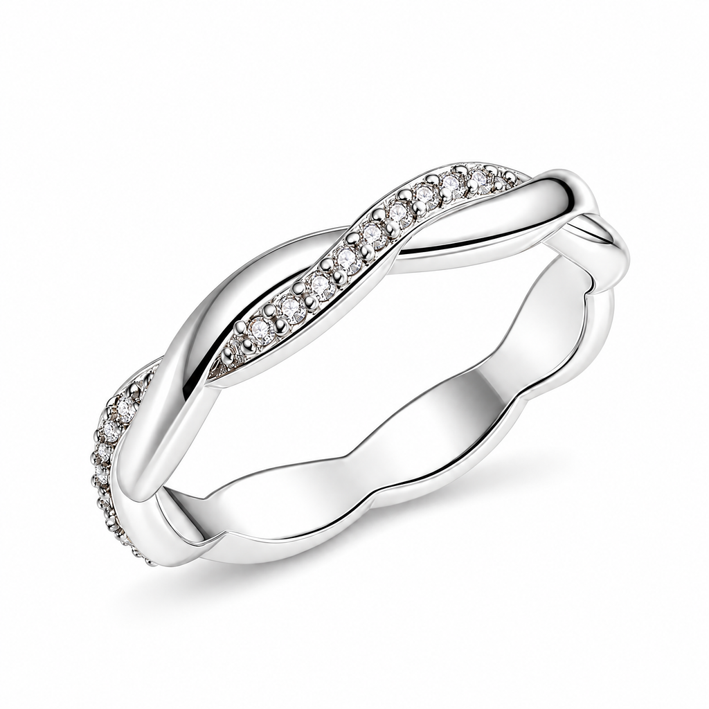 The Veda CZ Twisted Band — three-quarter white-studio view with soft shadow; studio-white edit and AI enhancement of the inherited reference-based AI visualization, not independently photographed jewelry.